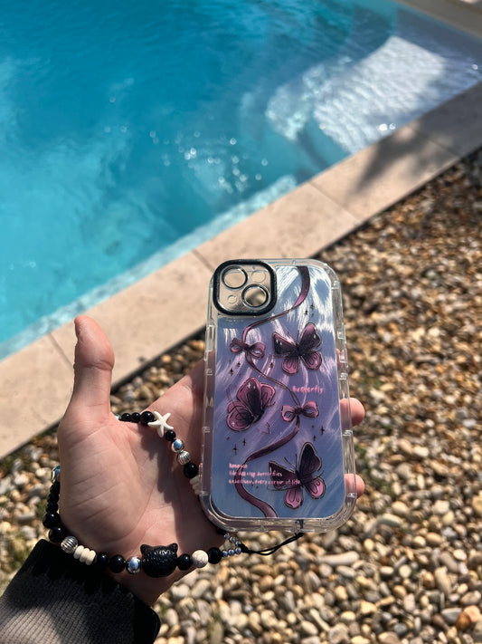 Coque iPhone 16, motif "Papillon Violets"